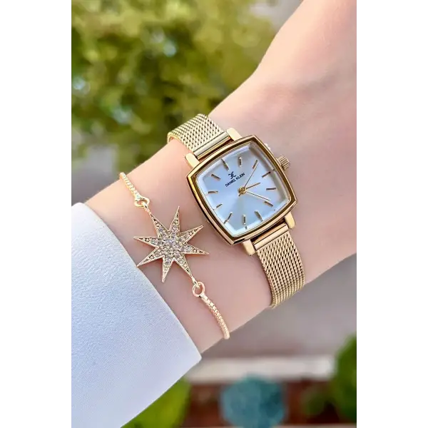 Daniel Klein DKISTE1220 Kadranı Gümüş Kordonu Gold Renk Hediye Paketli Kadın Kol Saati ve Bileklik