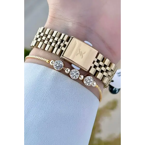Daniel Klein DKISTE1252 Gold Renk Hediye Paketli Kadın Kol Saati ve Bileklik