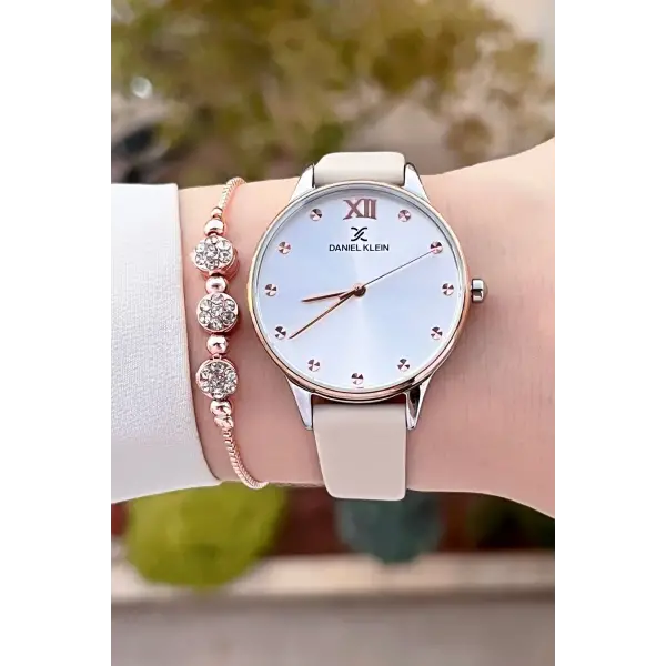 Daniel Klein DKISTE1328 Kasası Rose Gümüş Kordonu Krem Renk Hediye Paketli Kadın Kol Saati ve Bileklik