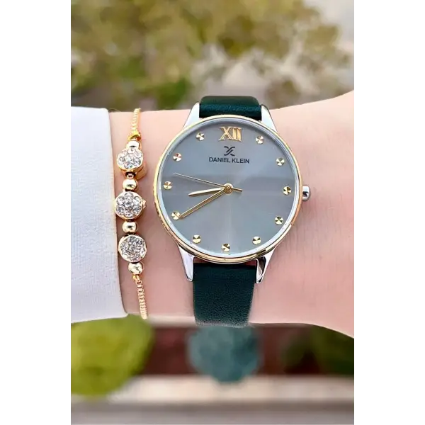 Daniel Klein DKISTE1332 Kasası Gold Gümüş Kordonu Yeşil Renk Hediye Paketli Kadın Kol Saati ve Bileklik