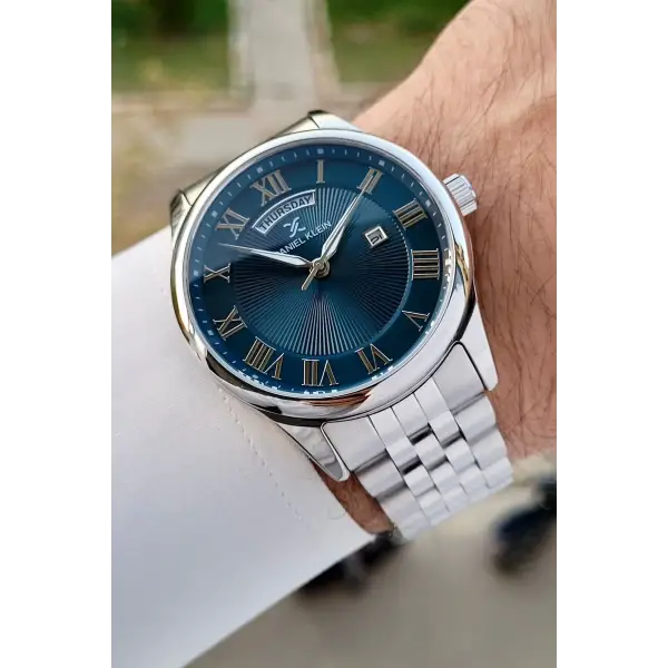 Daniel Klein DKISTE1308 Kadranı Lacivert Kordonu Gümüş Renk Takvim ve Gün Fonksiyonlu Hediye Paketli Erkek Kol Saati