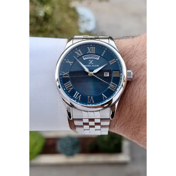 Daniel Klein DKISTE1308 Kadranı Lacivert Kordonu Gümüş Renk Takvim ve Gün Fonksiyonlu Hediye Paketli Erkek Kol Saati