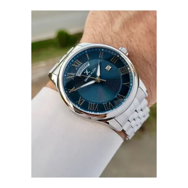 Daniel Klein DKISTE1308 Kadranı Lacivert Kordonu Gümüş Renk Takvim ve Gün Fonksiyonlu Hediye Paketli Erkek Kol Saati