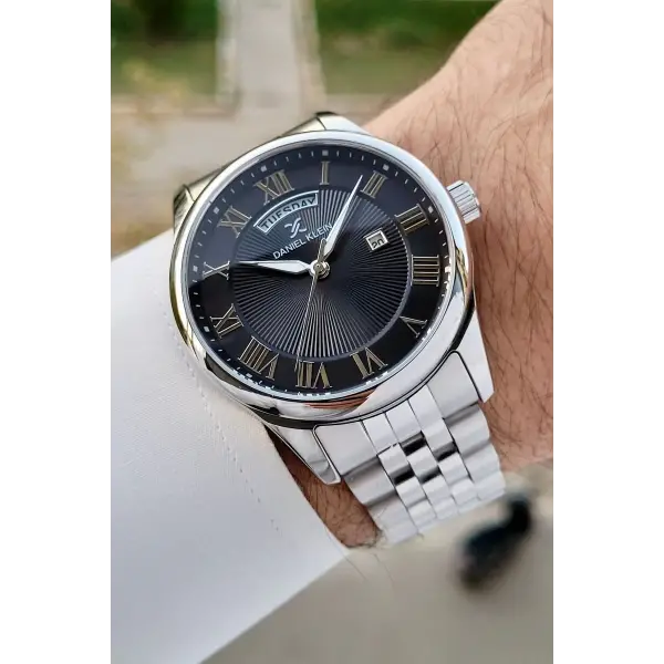 Daniel Klein DKISTE1287 Kadranı Siyah Kordonu Gümüş Renk Takvim ve Gün Fonksiyonlu Hediye Paketli Erkek Kol Saati