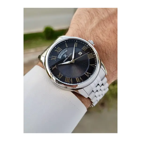 Daniel Klein DKISTE1287 Kadranı Siyah Kordonu Gümüş Renk Takvim ve Gün Fonksiyonlu Hediye Paketli Erkek Kol Saati