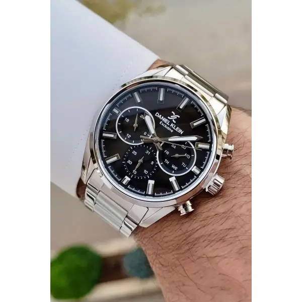 Daniel Klein DKISTE1395 Kadranı Siyah Kordonu Gümüş Renk Hediye Paketli Takvimli Erkek Kol Saati