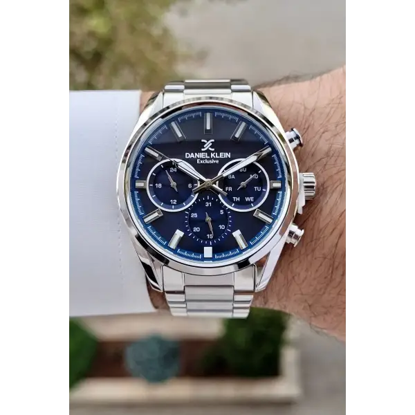 Daniel Klein DKISTE1391 Kadranı Lacivert Kordonu Gümüş Renk Hediye Paketli Takvimli Erkek Kol Saati
