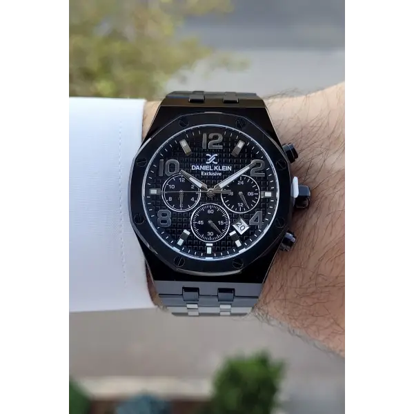 Daniel Klein DKISTE1389 Rakamları Gümüş Kordonu Siyah Renk Hediye Paketli Göstergeleri Aktif Erkek Kol Saati