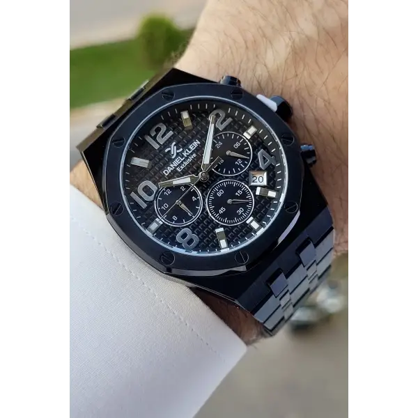 Daniel Klein DKISTE1389 Rakamları Gümüş Kordonu Siyah Renk Hediye Paketli Göstergeleri Aktif Erkek Kol Saati