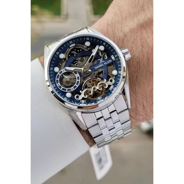 Daniel Klein DKISTE1421 Kadranı Lacivert Kordonu Gümüş Renk Otomatik Fonksiyonlu Fosforlu Erkek Kol Saati