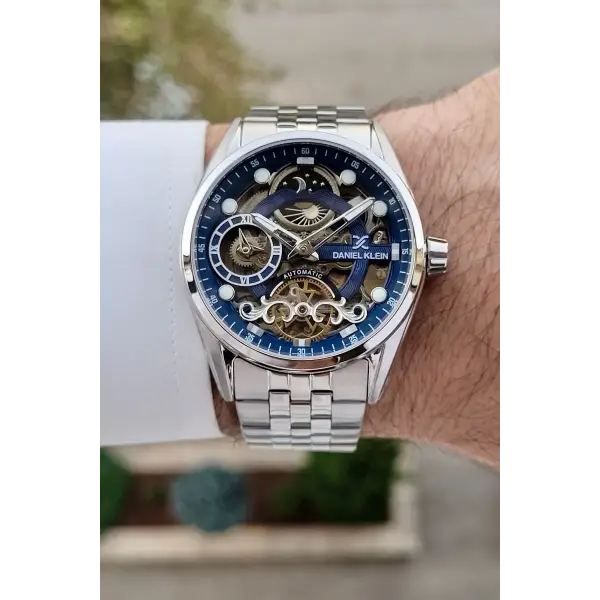 Daniel Klein DKISTE1421 Kadranı Lacivert Kordonu Gümüş Renk Otomatik Fonksiyonlu Fosforlu Erkek Kol Saati