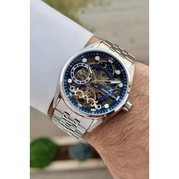 Daniel Klein DKISTE1421 Kadranı Lacivert Kordonu Gümüş Renk Otomatik Fonksiyonlu Fosforlu Erkek Kol Saati