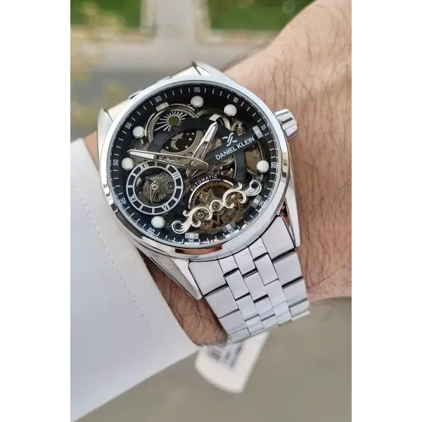 Daniel Klein DKISTE1425 Kadranı Siyah Kordonu Gümüş Renk Otomatik Fonksiyonlu Fosforlu Erkek Kol Saati