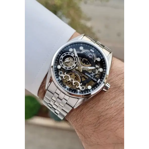 Daniel Klein DKISTE1425 Kadranı Siyah Kordonu Gümüş Renk Otomatik Fonksiyonlu Fosforlu Erkek Kol Saati