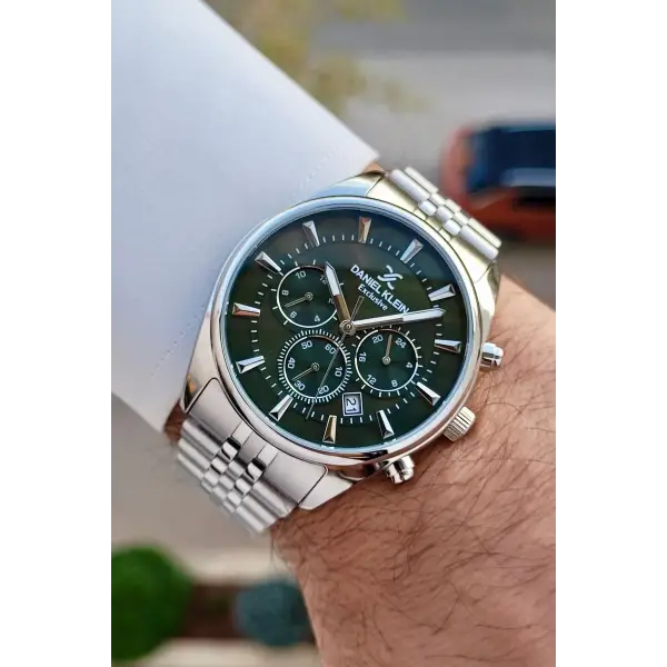 Daniel Klein DKISTE1428 Kadranı Yeşil Kordonu Gümüş Renk Göstergeli Erkek Kol Saati