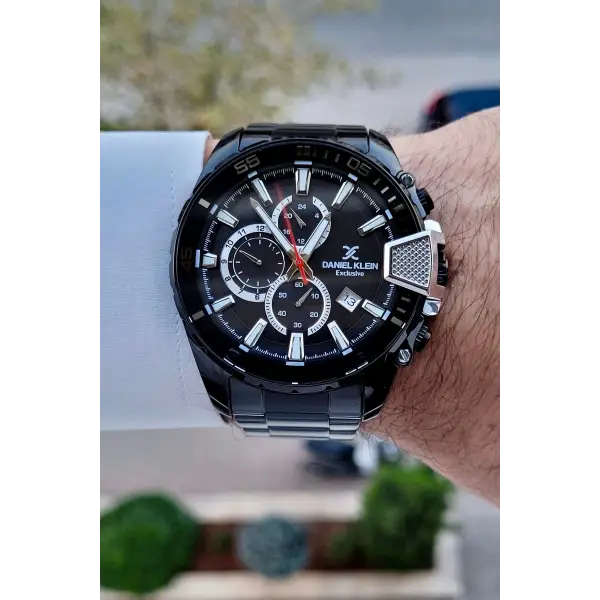 Daniel Klein DKISTE1437 Yazıları Gümüş Kordonu Siyah Renk Göstergeli Erkek Kol Saati