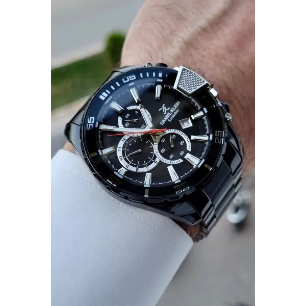 Daniel Klein DKISTE1437 Yazıları Gümüş Kordonu Siyah Renk Göstergeli Erkek Kol Saati