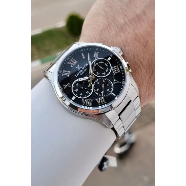 Daniel Klein DKISTE1528 Kadranı Siyah Kordonu Gümüş Renk 45 mm Erkek Kol Saati