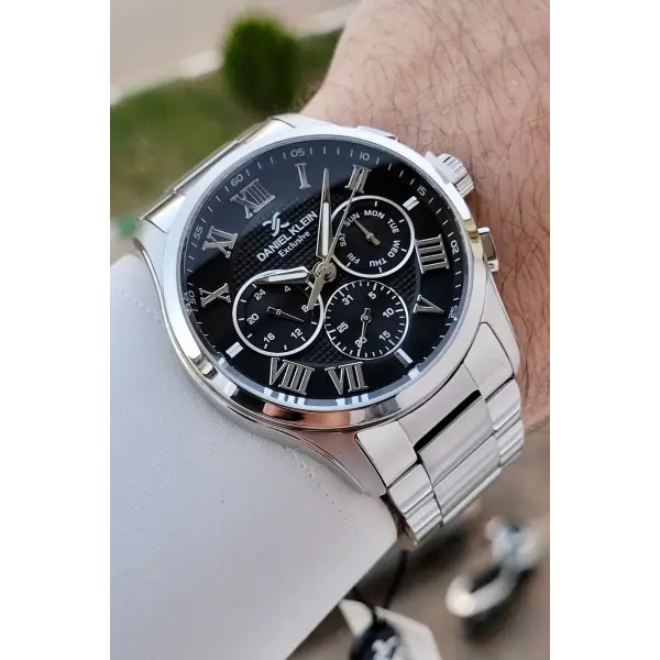 Daniel Klein DKISTE1528 Kadranı Siyah Kordonu Gümüş Renk 45 mm Erkek Kol Saati