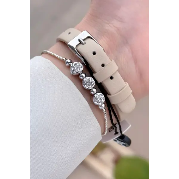 Daniel Klein DKISTE1535 Kasası Gümüş Kordonu Bej Renk Kadın Kol Saati Ve Bileklik