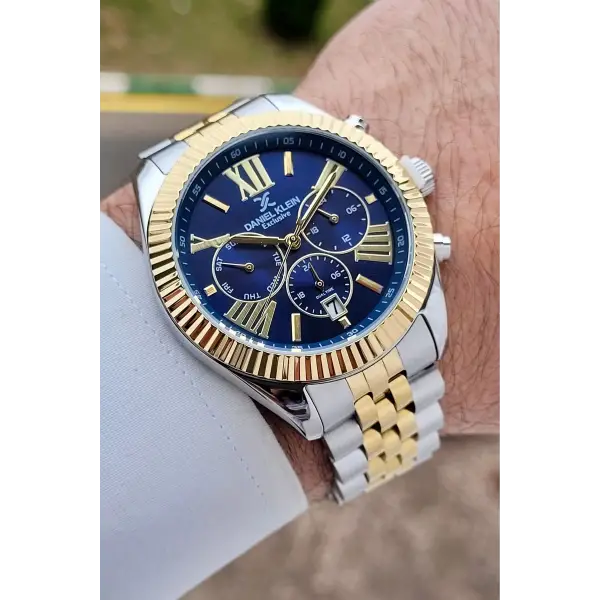 Daniel Klein DKISTE1603 Kadranı Lacivert Kordonu Gold Gümüş Renk 42 mm Erkek Kol Saati