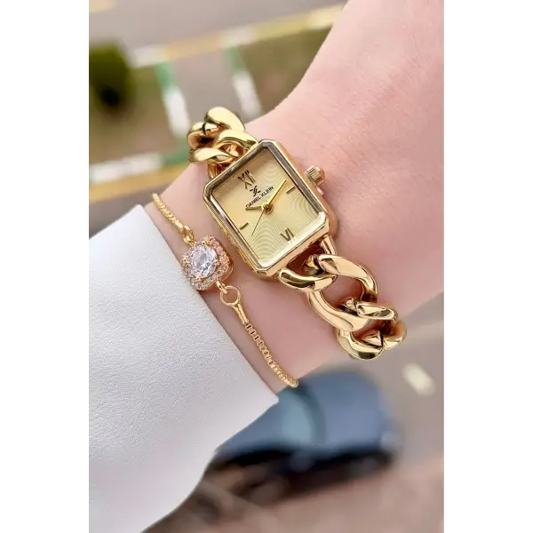 Daniel Klein DKISTE1589 Gold Renk Kadın Kol Saati ve Bielklik