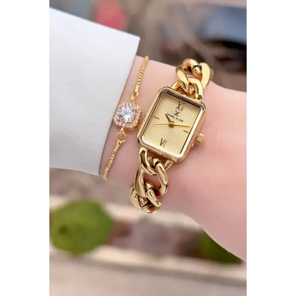 Daniel Klein DKISTE1589 Gold Renk Kadın Kol Saati ve Bielklik