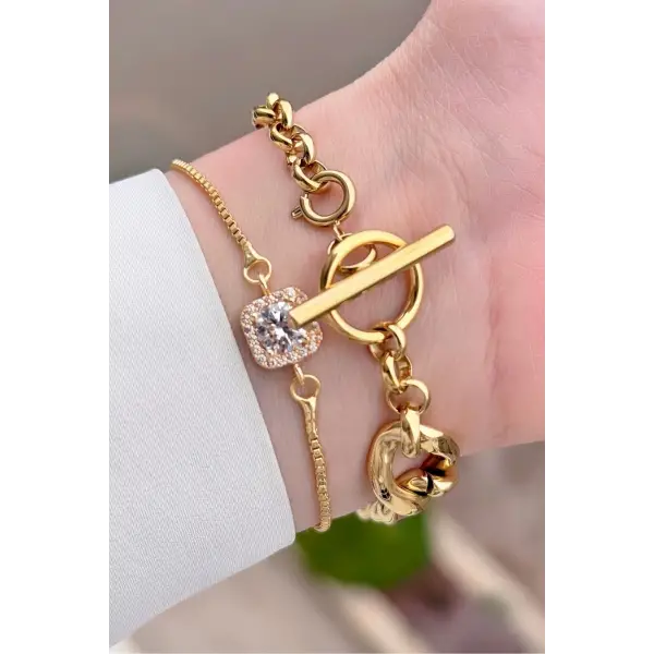 Daniel Klein DKISTE1589 Gold Renk Kadın Kol Saati ve Bielklik