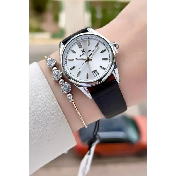 Kasası Gümüş Kordonu Siyah Renk 32 Mm Takvimli Kadın Kol Saati Ve Bileklik