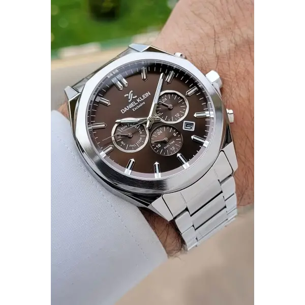 Kadranı Kahverengi Kordonu Gümüş Renk Iç Göstergeleri Aktif Erkek Kol Saati