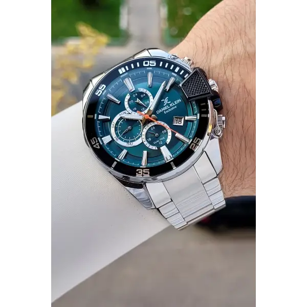 Kadranı Petrol Mavisi Kordonu Gümüş Renk 47 Mm İç Göstergeleri Aktif Erkek Kol Saati