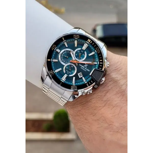 Kadranı Petrol Mavisi Kordonu Gümüş Renk 47 Mm İç Göstergeleri Aktif Erkek Kol Saati