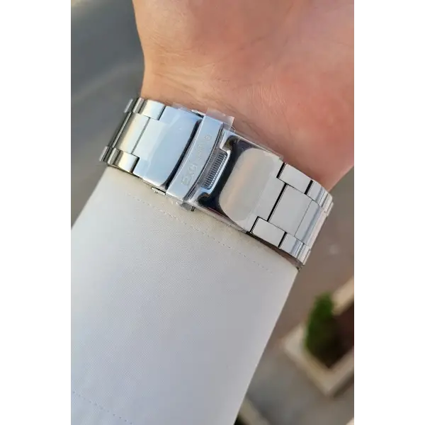 Kadranı Petrol Mavisi Kordonu Gümüş Renk 47 Mm İç Göstergeleri Aktif Erkek Kol Saati