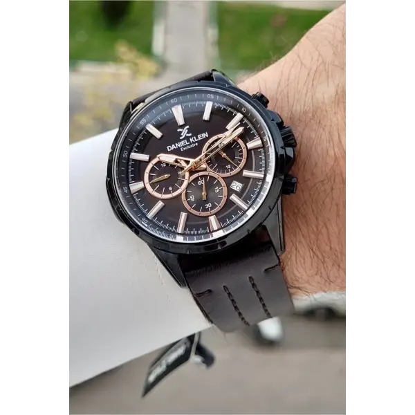 Kasası Siyah Kordonu Kahverengi Renk İç Göstergeleri Aktif Erkek Kol Saati