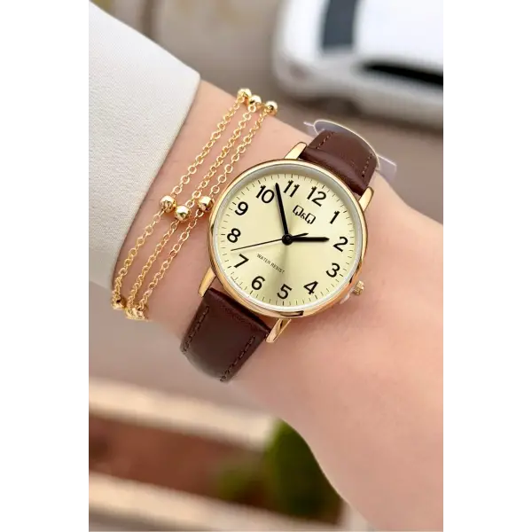 Kasası Gold Kordonu Kahverengi Renk 30,5 Mm Rakamlı Kadın Kol Saati ve Hediye Bileklik