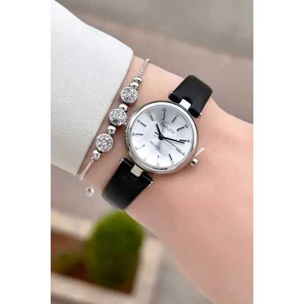 Kasası Gümüş Kordonu Siyah Renk 25 Mm Kadın Kol Saati ve Hediye Bileklik