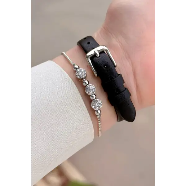 Kasası Gümüş Kordonu Siyah Renk 25 Mm Kadın Kol Saati ve Hediye Bileklik