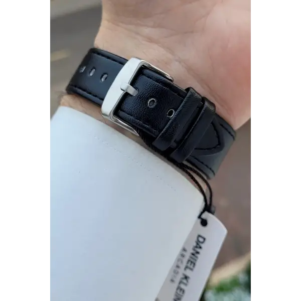 Kasası Gümüş Kordonu Siyah Renk Rakamlı 42,5 Mm Hediye Paketli Erkek Kol Saati