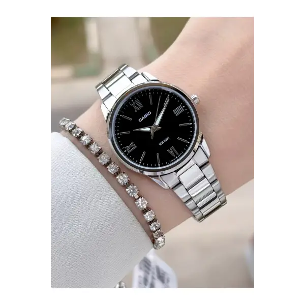 Kadranı Siyah Kordonu Gümüş Renk Garantili Kadın Kol Saati