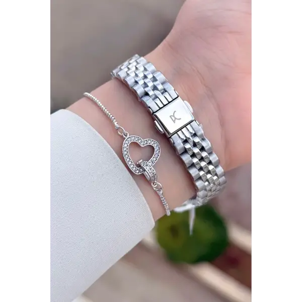 Kadranı Pembe Kordonu Gümüş Renk Kadın Kol Saati