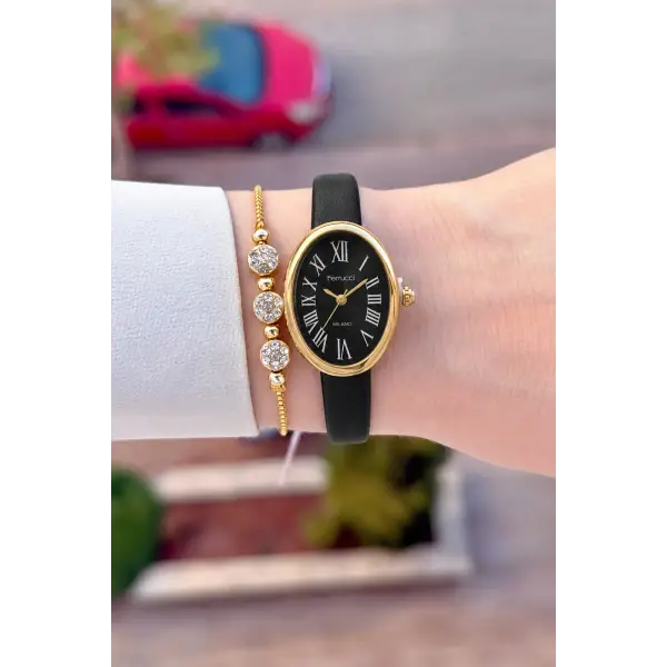 Kasası Gold Kordonu Siyah Renk Hediye Paketli 22 Mm 5 ATM Kadın Kol Saati