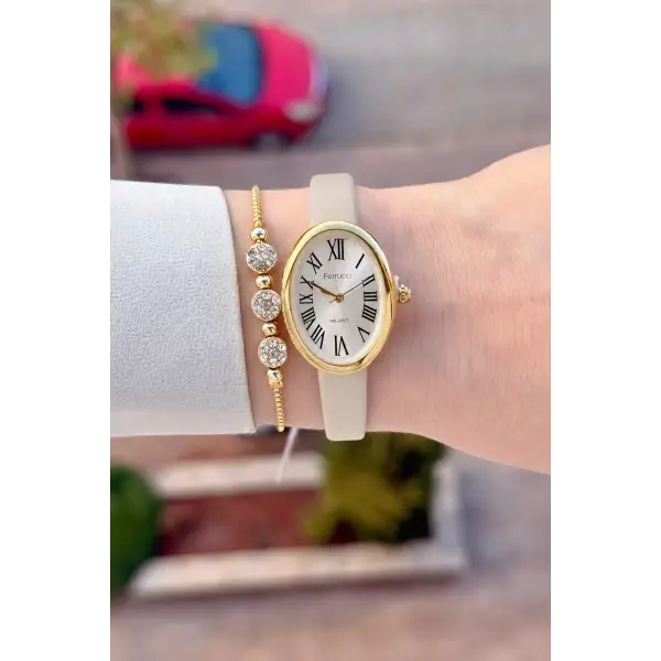 Kasası Gold Kordonu Krem Renk Hediye Paketli 22 Mm 5 ATM Kadın Kol Saati
