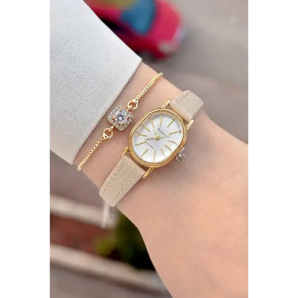 Kasası Gold Kordonu Krem Renk Hediye Paketli 20 Mm 5 ATM Kadın Kol Saati
