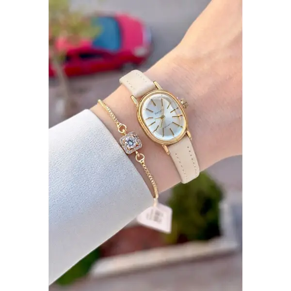 Kasası Gold Kordonu Krem Renk Hediye Paketli 20 Mm 5 ATM Kadın Kol Saati