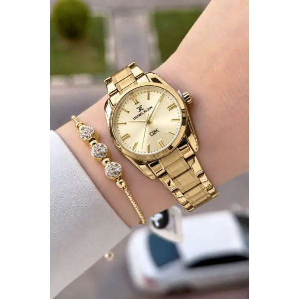 Kadranı Sarı Kordonu Gold Renk 30 Mm Hediye Paketli Kadın Kol Saati
