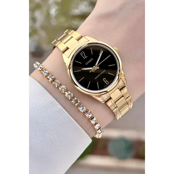 Casio CSISTE139 Kadranı Siyah Kordonu Gold Renk Kadın Kol Saati