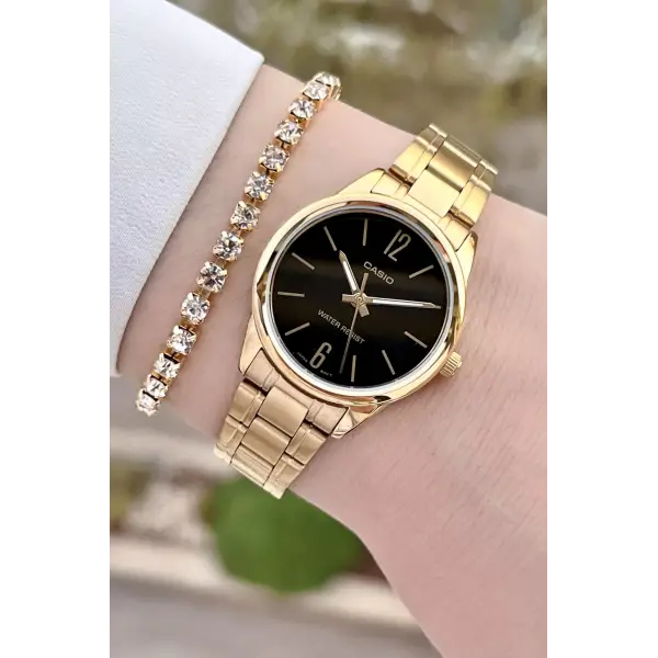 Casio CSISTE139 Kadranı Siyah Kordonu Gold Renk Kadın Kol Saati
