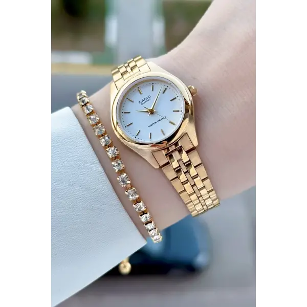 Casio CSISTE208 Casio Kadranı Beyaz Kordonu Gold Renk Kadın Kol Saati