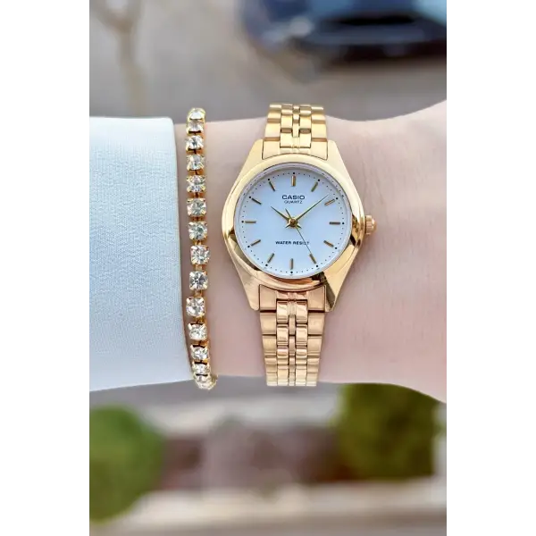 Casio CSISTE208 Casio Kadranı Beyaz Kordonu Gold Renk Kadın Kol Saati