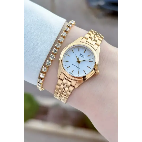 Casio CSISTE208 Casio Kadranı Beyaz Kordonu Gold Renk Kadın Kol Saati